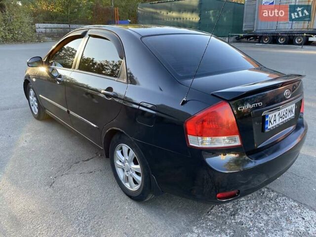 Черный Киа Черато, объемом двигателя 1.98 л и пробегом 335 тыс. км за 4100 $, фото 3 на Automoto.ua