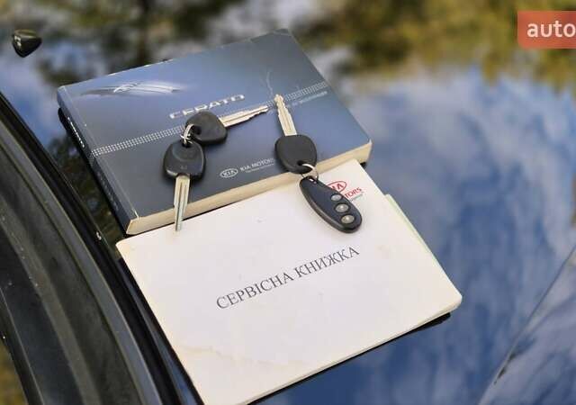 Черный Киа Черато, объемом двигателя 1.59 л и пробегом 78 тыс. км за 5499 $, фото 36 на Automoto.ua