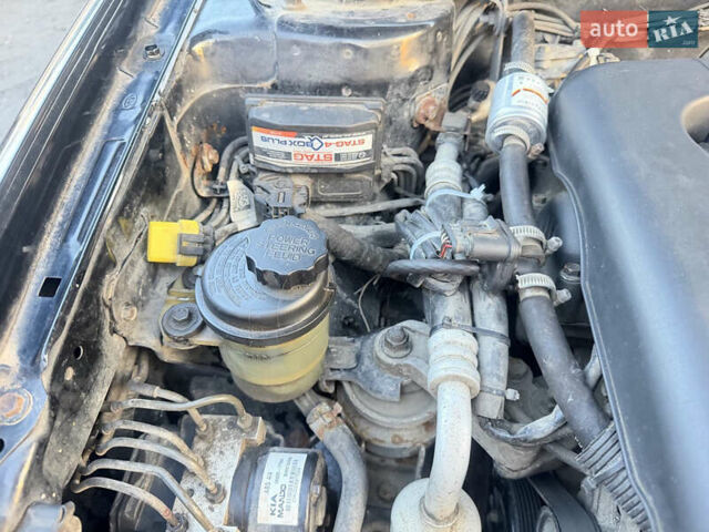 Чорний Кіа Черато, об'ємом двигуна 1.59 л та пробігом 250 тис. км за 4300 $, фото 14 на Automoto.ua