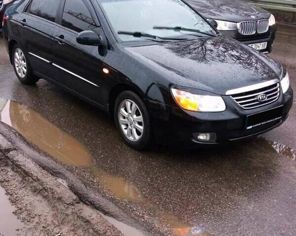 Черный Киа Черато, объемом двигателя 1.98 л и пробегом 174 тыс. км за 5900 $, фото 1 на Automoto.ua
