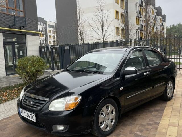 Черный Киа Черато, объемом двигателя 1.6 л и пробегом 256 тыс. км за 4200 $, фото 1 на Automoto.ua