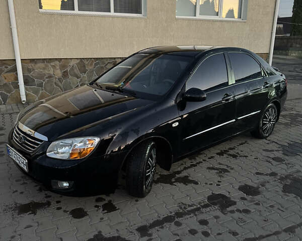 Чорний Кіа Черато, об'ємом двигуна 1.6 л та пробігом 197 тис. км за 5500 $, фото 5 на Automoto.ua
