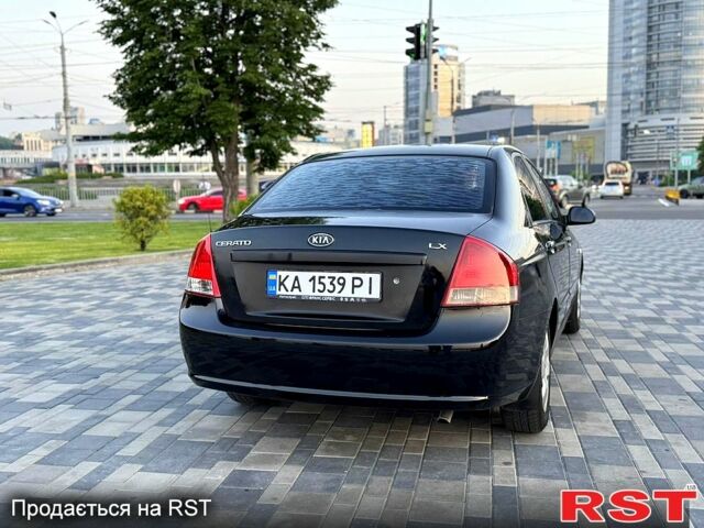 Черный Киа Черато, объемом двигателя 1.6 л и пробегом 220 тыс. км за 3800 $, фото 3 на Automoto.ua