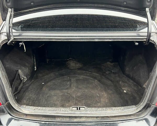 Черный Киа Черато, объемом двигателя 1.58 л и пробегом 355 тыс. км за 3500 $, фото 10 на Automoto.ua