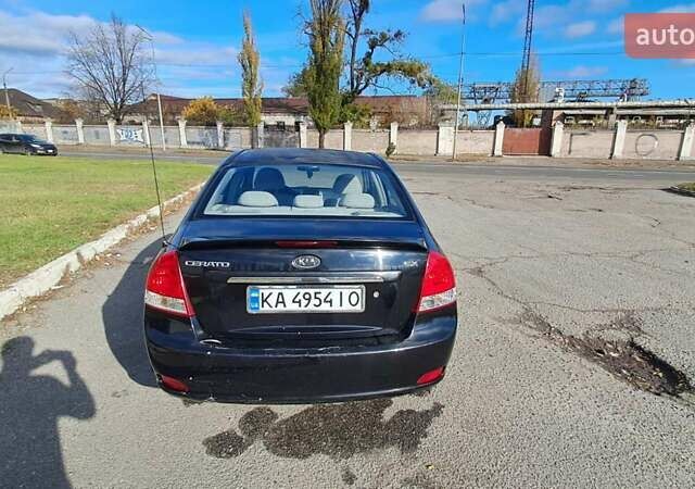 Черный Киа Черато, объемом двигателя 1.59 л и пробегом 349 тыс. км за 4000 $, фото 2 на Automoto.ua