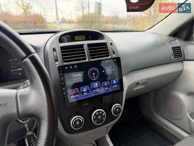 Чорний Кіа Черато, об'ємом двигуна 1.6 л та пробігом 224 тис. км за 4900 $, фото 44 на Automoto.ua