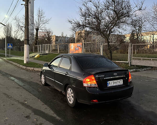 Черный Киа Черато, объемом двигателя 1.6 л и пробегом 294 тыс. км за 3500 $, фото 4 на Automoto.ua