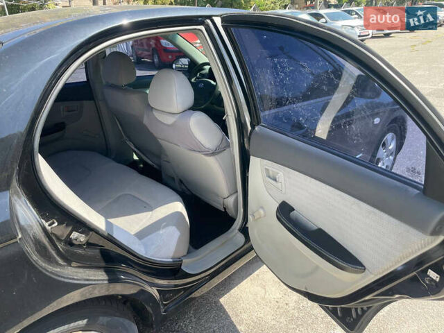 Черный Киа Черато, объемом двигателя 1.59 л и пробегом 210 тыс. км за 4100 $, фото 10 на Automoto.ua