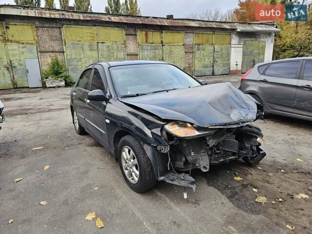 Чорний Кіа Черато, об'ємом двигуна 1.59 л та пробігом 200 тис. км за 1350 $, фото 3 на Automoto.ua