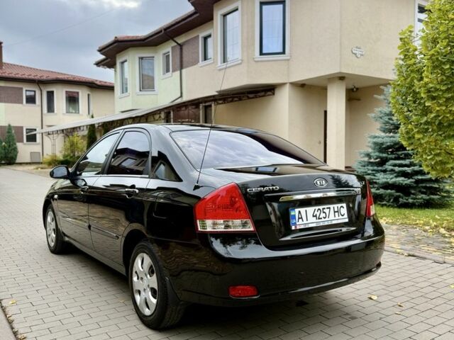 Чорний Кіа Черато, об'ємом двигуна 1.6 л та пробігом 320 тис. км за 3500 $, фото 2 на Automoto.ua