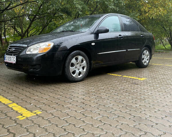 Чорний Кіа Черато, об'ємом двигуна 1.59 л та пробігом 232 тис. км за 4000 $, фото 8 на Automoto.ua