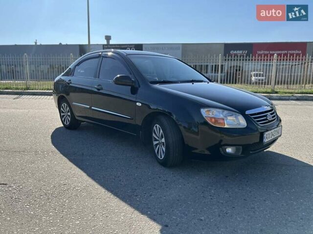 Чорний Кіа Черато, об'ємом двигуна 1.98 л та пробігом 163 тис. км за 5500 $, фото 1 на Automoto.ua