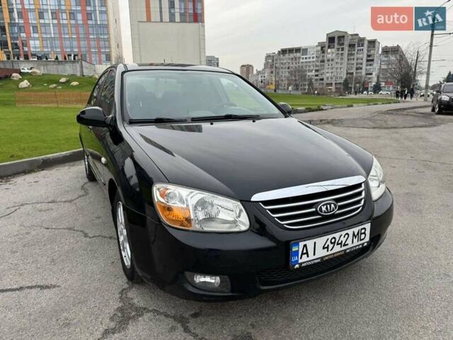 Черный Киа Черато, объемом двигателя 1.6 л и пробегом 232 тыс. км за 3850 $, фото 1 на Automoto.ua