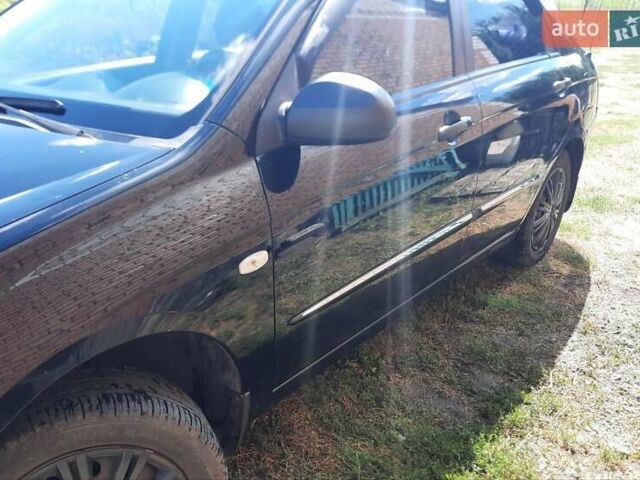 Черный Киа Черато, объемом двигателя 1.6 л и пробегом 277 тыс. км за 4200 $, фото 4 на Automoto.ua