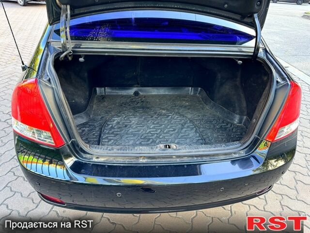 Черный Киа Черато, объемом двигателя 1.6 л и пробегом 174 тыс. км за 4550 $, фото 7 на Automoto.ua