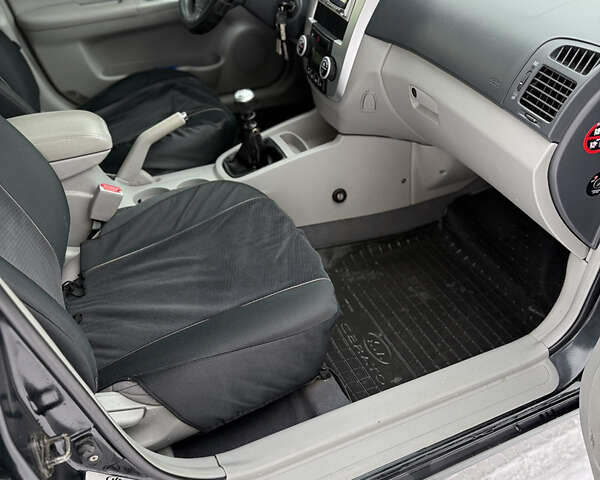 Черный Киа Черато, объемом двигателя 1.6 л и пробегом 230 тыс. км за 4649 $, фото 37 на Automoto.ua