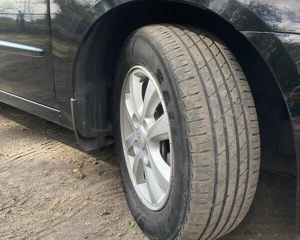 Чорний Кіа Черато, об'ємом двигуна 1.6 л та пробігом 157 тис. км за 5800 $, фото 8 на Automoto.ua