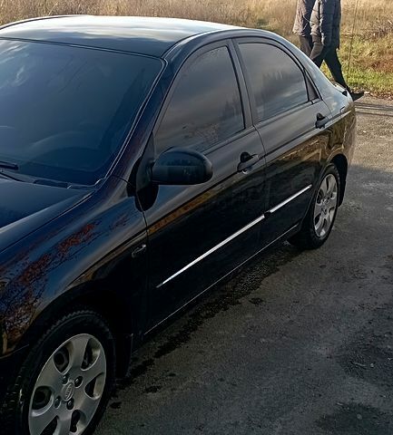 Кіа Черато 2007 у Сумах на Automoto.ua Чорний Кіа Черато, об'ємом двигуна 1.6 л та пробігом 221 тис. км за 4500 $, фото 5 на Automoto.ua