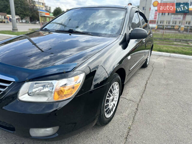 Чорний Кіа Черато, об'ємом двигуна 1.6 л та пробігом 272 тис. км за 5200 $, фото 5 на Automoto.ua