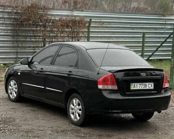 Черный Киа Черато, объемом двигателя 1.59 л и пробегом 273 тыс. км за 2999 $, фото 4 на Automoto.ua