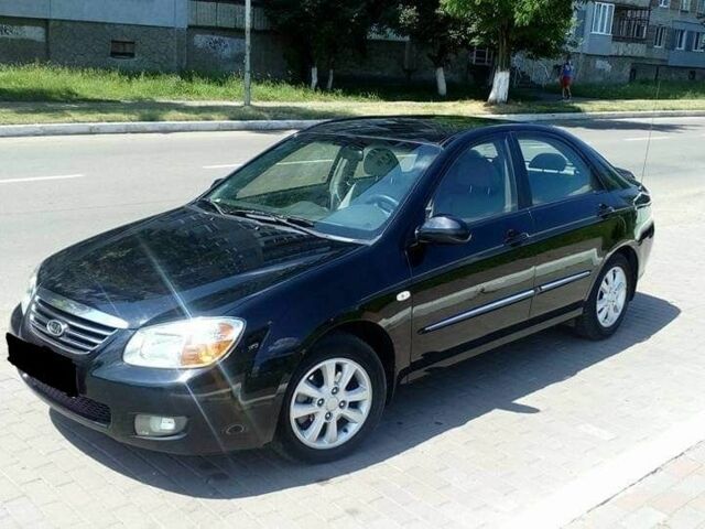 Черный Киа Черато, объемом двигателя 2 л и пробегом 240 тыс. км за 4700 $, фото 1 на Automoto.ua