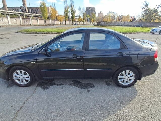 Черный Киа Черато, объемом двигателя 1.6 л и пробегом 258 тыс. км за 4300 $, фото 1 на Automoto.ua