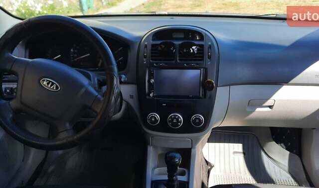 Черный Киа Черато, объемом двигателя 1.6 л и пробегом 277 тыс. км за 4200 $, фото 6 на Automoto.ua