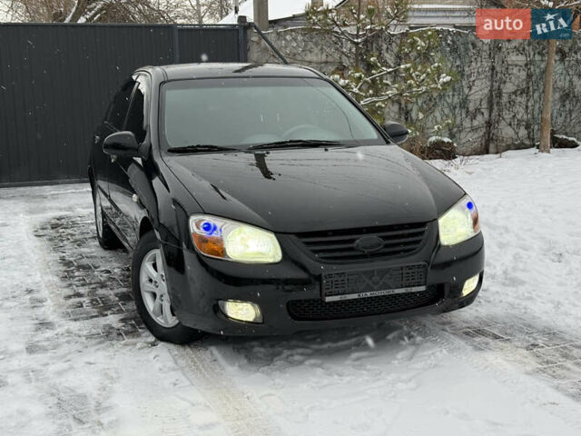 Черный Киа Черато, объемом двигателя 1.98 л и пробегом 183 тыс. км за 5999 $, фото 9 на Automoto.ua