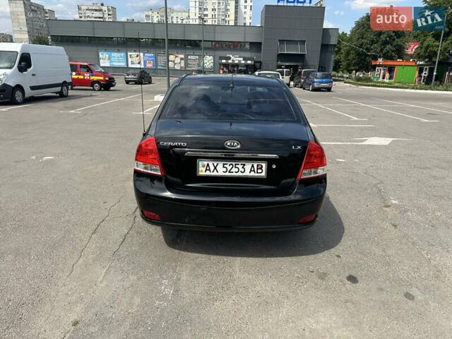 Чорний Кіа Черато, об'ємом двигуна 1.6 л та пробігом 272 тис. км за 5200 $, фото 11 на Automoto.ua
