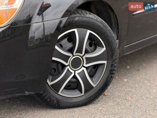 Чорний Кіа Черато, об'ємом двигуна 1.6 л та пробігом 224 тис. км за 4900 $, фото 6 на Automoto.ua