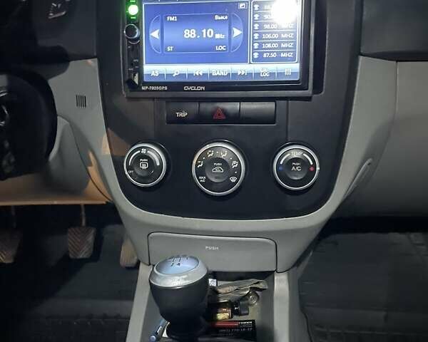 Черный Киа Черато, объемом двигателя 1.59 л и пробегом 273 тыс. км за 4200 $, фото 11 на Automoto.ua