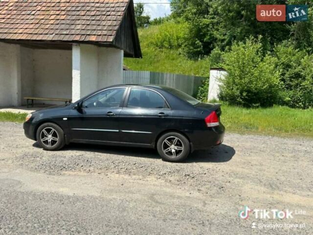 Чорний Кіа Черато, об'ємом двигуна 1.6 л та пробігом 213 тис. км за 3999 $, фото 14 на Automoto.ua