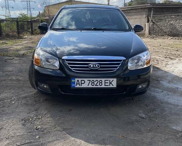 Чорний Кіа Черато, об'ємом двигуна 1.6 л та пробігом 157 тис. км за 5800 $, фото 1 на Automoto.ua