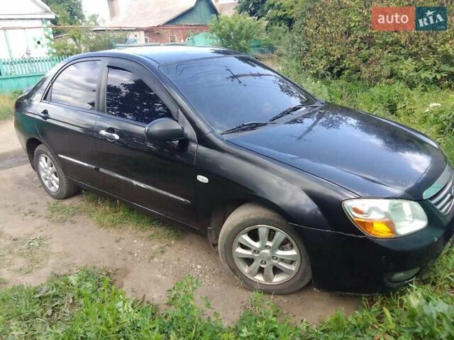 Чорний Кіа Черато, об'ємом двигуна 2 л та пробігом 310 тис. км за 4000 $, фото 2 на Automoto.ua