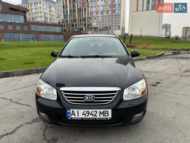 Черный Киа Черато, объемом двигателя 1.6 л и пробегом 232 тыс. км за 3850 $, фото 6 на Automoto.ua