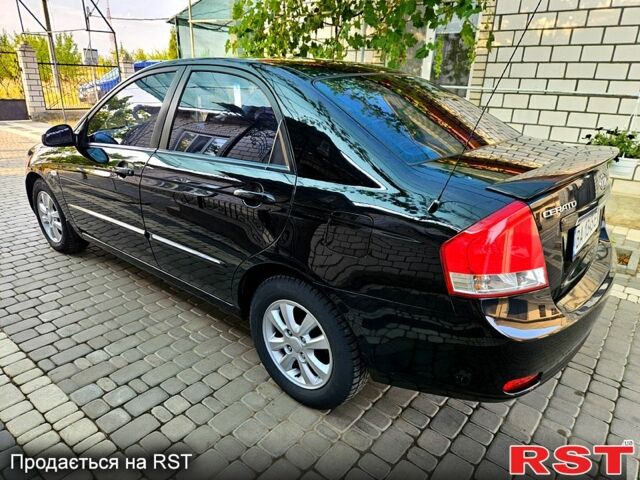 Чорний Кіа Черато, об'ємом двигуна 2 л та пробігом 205 тис. км за 4500 $, фото 3 на Automoto.ua