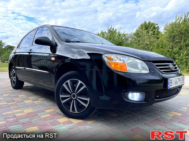 Черный Киа Черато, объемом двигателя 1.6 л и пробегом 190 тыс. км за 4350 $, фото 12 на Automoto.ua