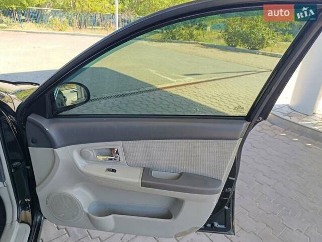 Чорний Кіа Черато, об'ємом двигуна 1.59 л та пробігом 219 тис. км за 4600 $, фото 51 на Automoto.ua
