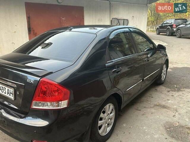 Черный Киа Черато, объемом двигателя 1.6 л и пробегом 230 тыс. км за 4950 $, фото 2 на Automoto.ua