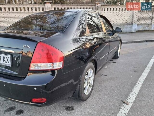 Черный Киа Черато, объемом двигателя 1.6 л и пробегом 246 тыс. км за 4850 $, фото 3 на Automoto.ua