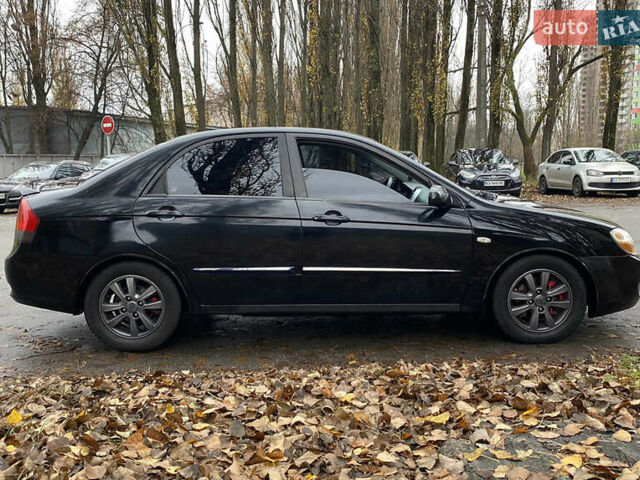 Черный Киа Черато, объемом двигателя 1.98 л и пробегом 306 тыс. км за 3800 $, фото 2 на Automoto.ua