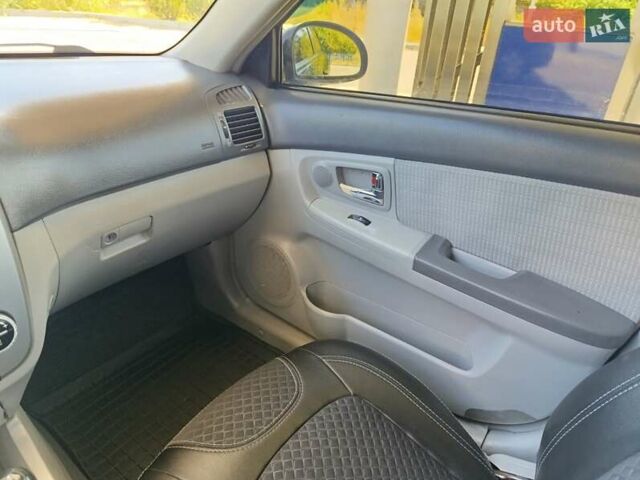 Чорний Кіа Черато, об'ємом двигуна 1.59 л та пробігом 219 тис. км за 4600 $, фото 36 на Automoto.ua