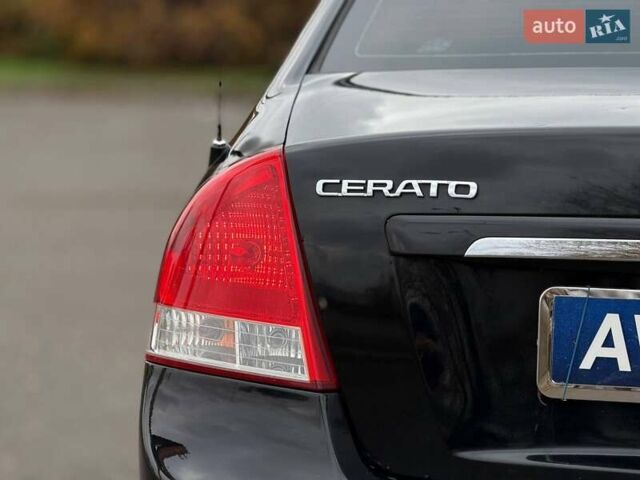Чорний Кіа Черато, об'ємом двигуна 1.6 л та пробігом 224 тис. км за 4900 $, фото 20 на Automoto.ua