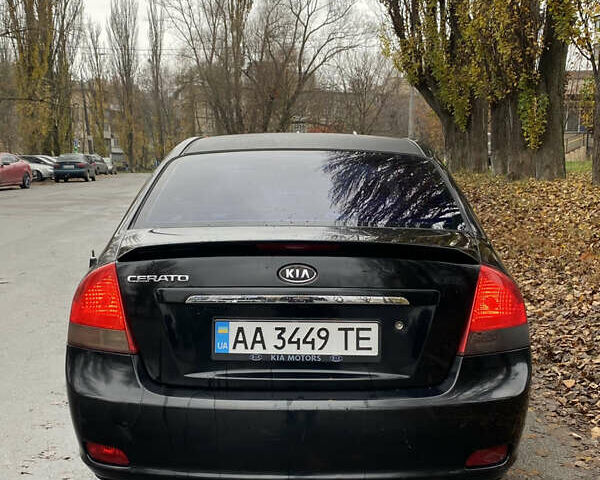 Черный Киа Черато, объемом двигателя 1.98 л и пробегом 306 тыс. км за 3800 $, фото 1 на Automoto.ua