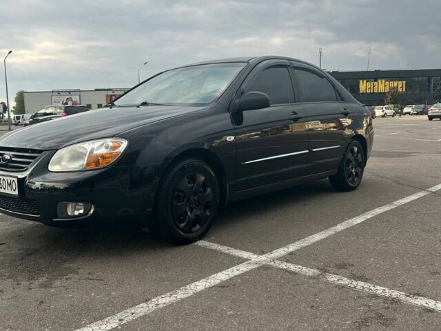 Черный Киа Черато, объемом двигателя 1.6 л и пробегом 292 тыс. км за 4000 $, фото 2 на Automoto.ua