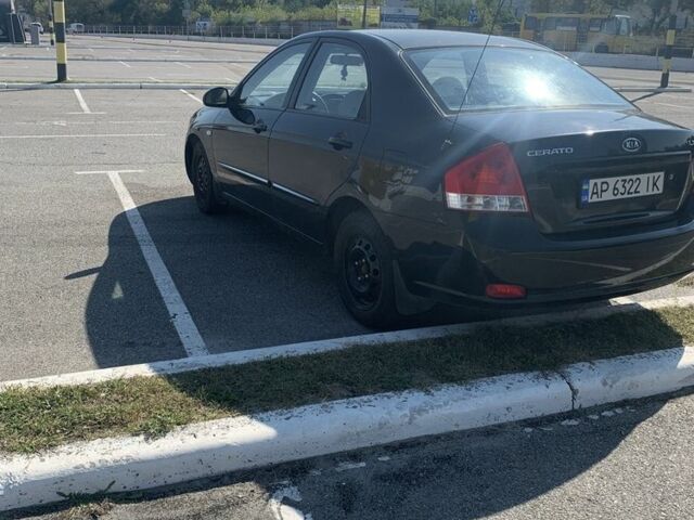 Черный Киа Черато, объемом двигателя 1.6 л и пробегом 172 тыс. км за 3400 $, фото 4 на Automoto.ua