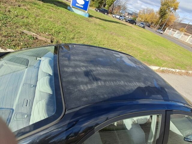 Черный Киа Черато, объемом двигателя 1.6 л и пробегом 258 тыс. км за 4300 $, фото 5 на Automoto.ua