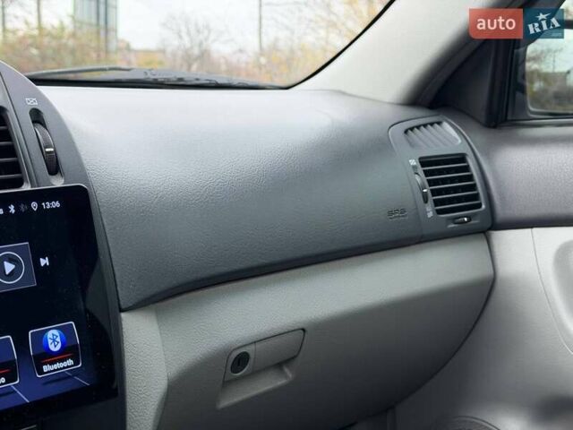 Чорний Кіа Черато, об'ємом двигуна 1.6 л та пробігом 224 тис. км за 4900 $, фото 50 на Automoto.ua