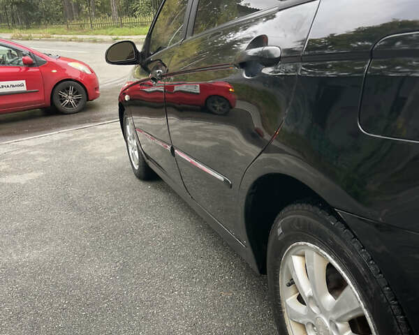 Черный Киа Черато, объемом двигателя 1.6 л и пробегом 211 тыс. км за 3200 $, фото 11 на Automoto.ua