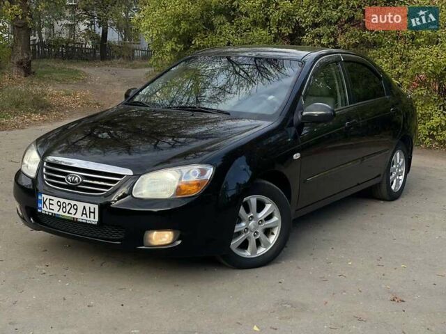 Черный Киа Черато, объемом двигателя 2 л и пробегом 173 тыс. км за 4800 $, фото 2 на Automoto.ua
